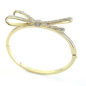 KATE SPADE（ケイトスペード） Tied Up Pave Hinge Bangle リボンモチーフ パヴェ・クリスタル バングル WBRU9480-921