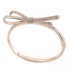 KATE SPADE（ケイトスペード） Tied Up Pave Hinge Bangle リボンモチーフ パヴェ・クリスタル バングル WBRU9482-704