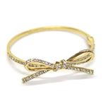 KATE SPADE（ケイトスペード） SKINNY MINI pave bow bangle リボンモチーフ パヴェ・クリスタル バングル ブレスレット WBRU5157-711