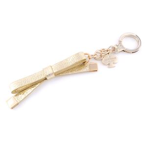 KATE SPADE（ケイトスペード） 1KRU0112-711 Metallic Leather Bow Keychain Key Fobs リボンモチーフ キーリング キーホルダー バッグチャーム